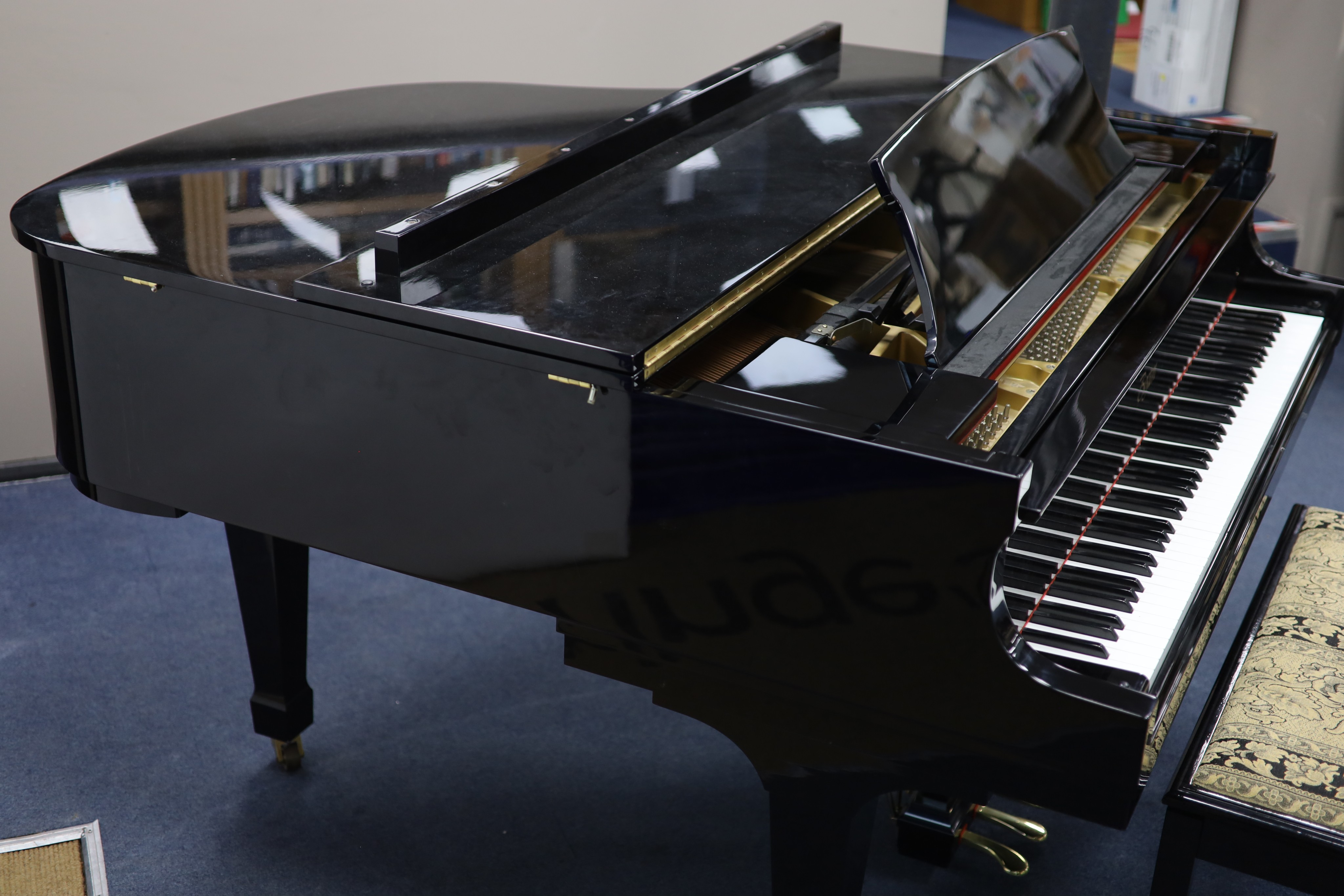 A Steinway & Sons Boston 156 ebonised boudoir grand piano H 102cm. W 146cm. D 150cm.